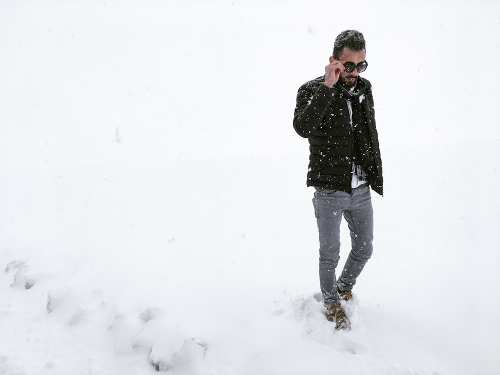 man standing on snow
