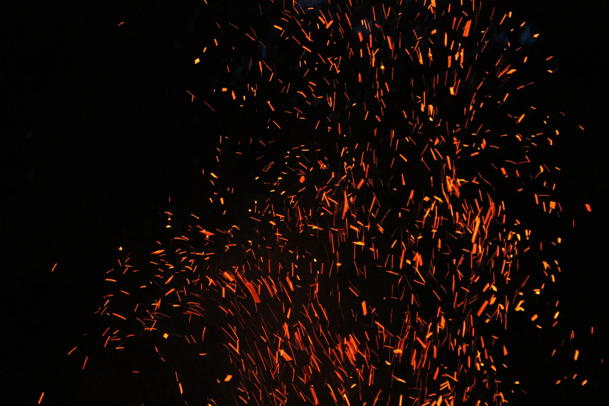 Glowing embers, the spark of action