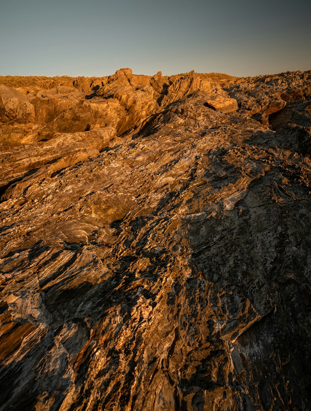 a rocky landscape with a few rocks on the ground