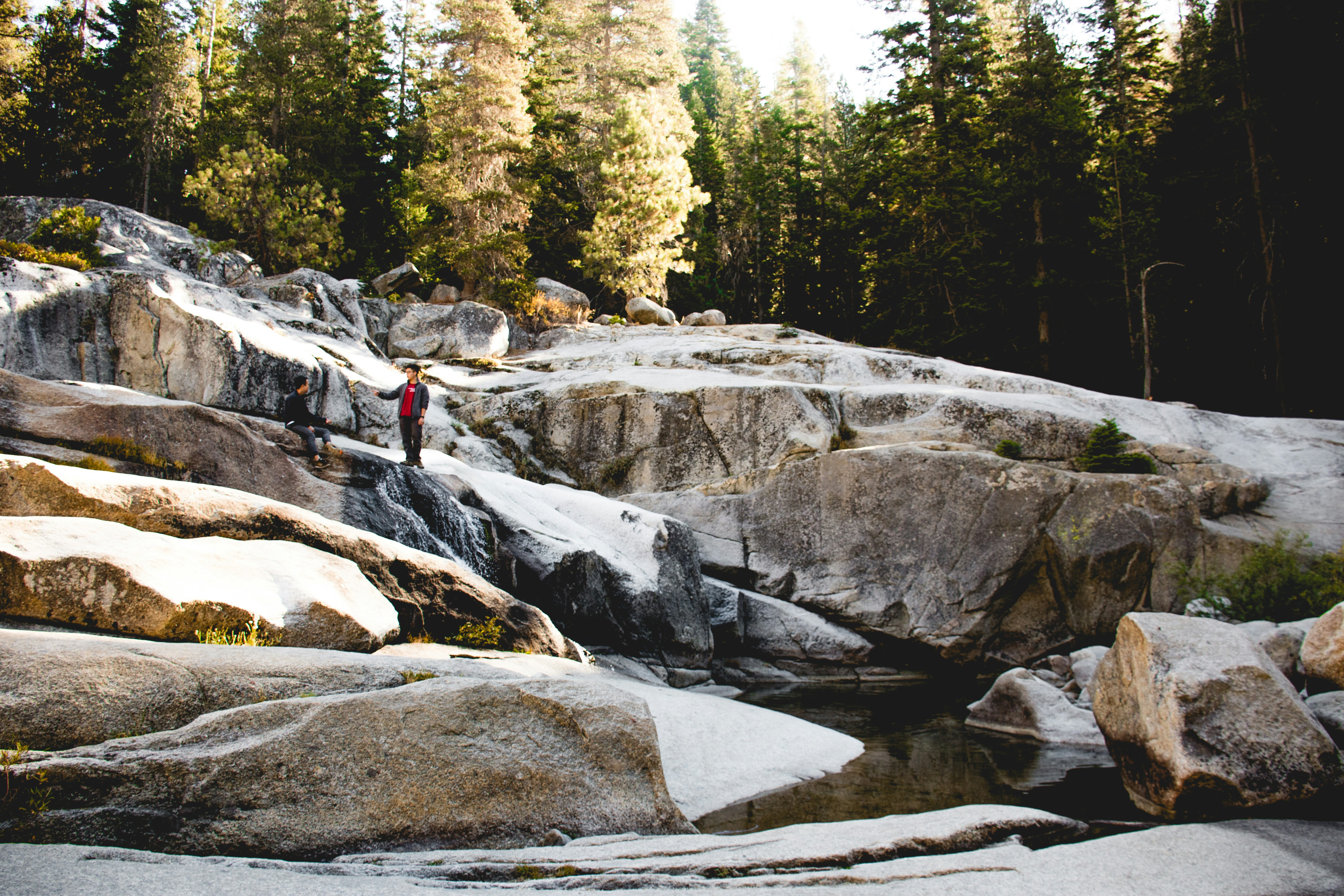 person standing on waterfalls, 