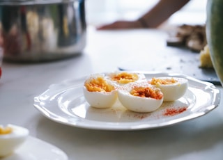 sliced hard boiled eggs on plate