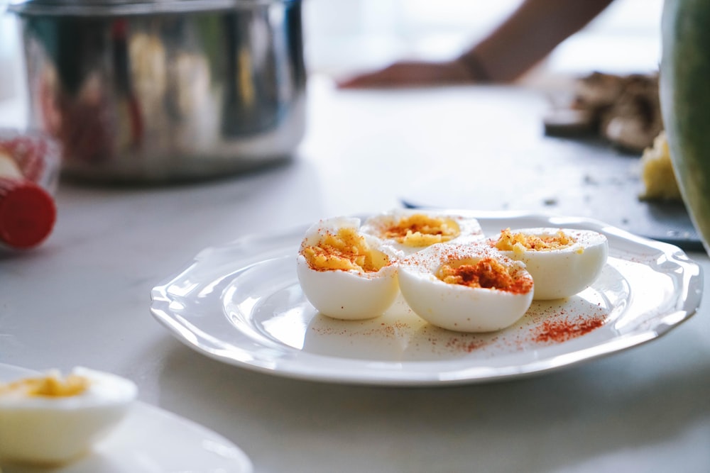 sliced hard boiled eggs on plate