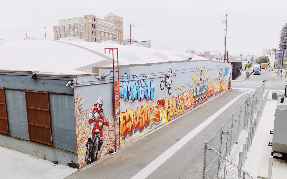 multicolored graffiti wall art on building