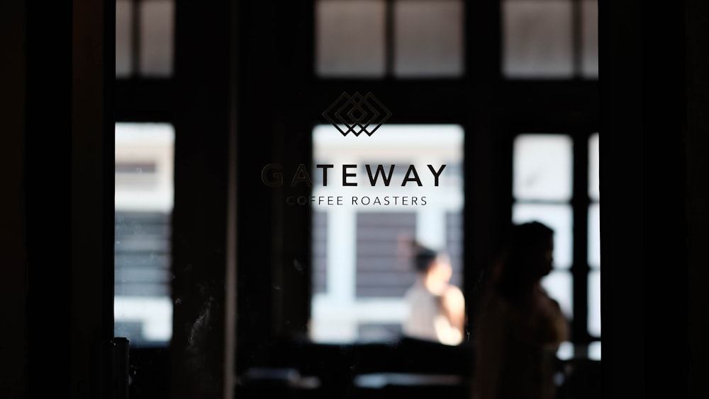 selective focus photography of Gateway coffee roasters logo