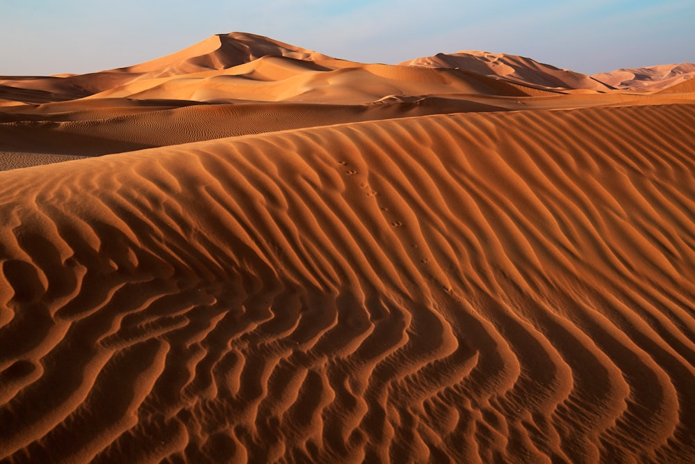 sand dunes during daytime