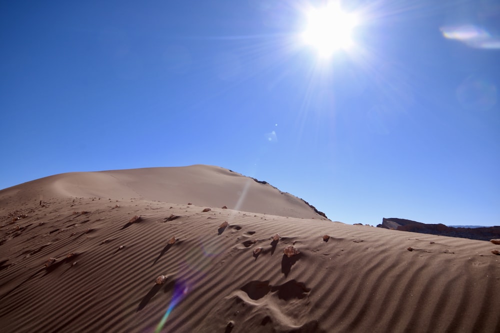 sand dunes during daytime