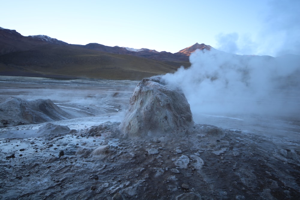 smoke coming from rocks viewing mountain