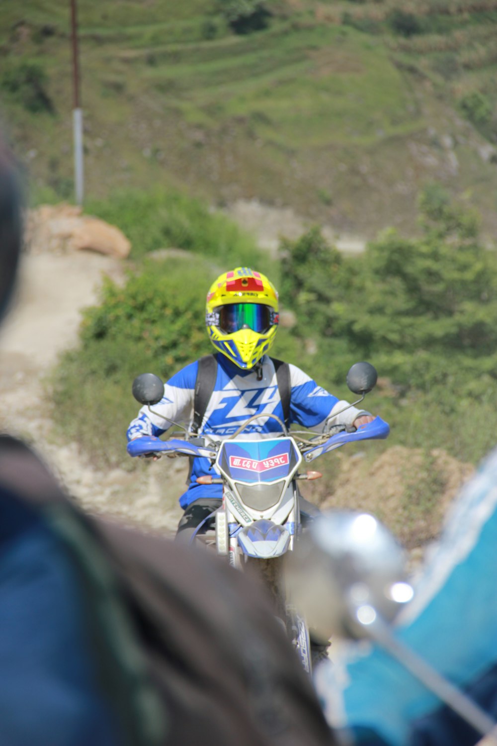 man riding on dirt bike