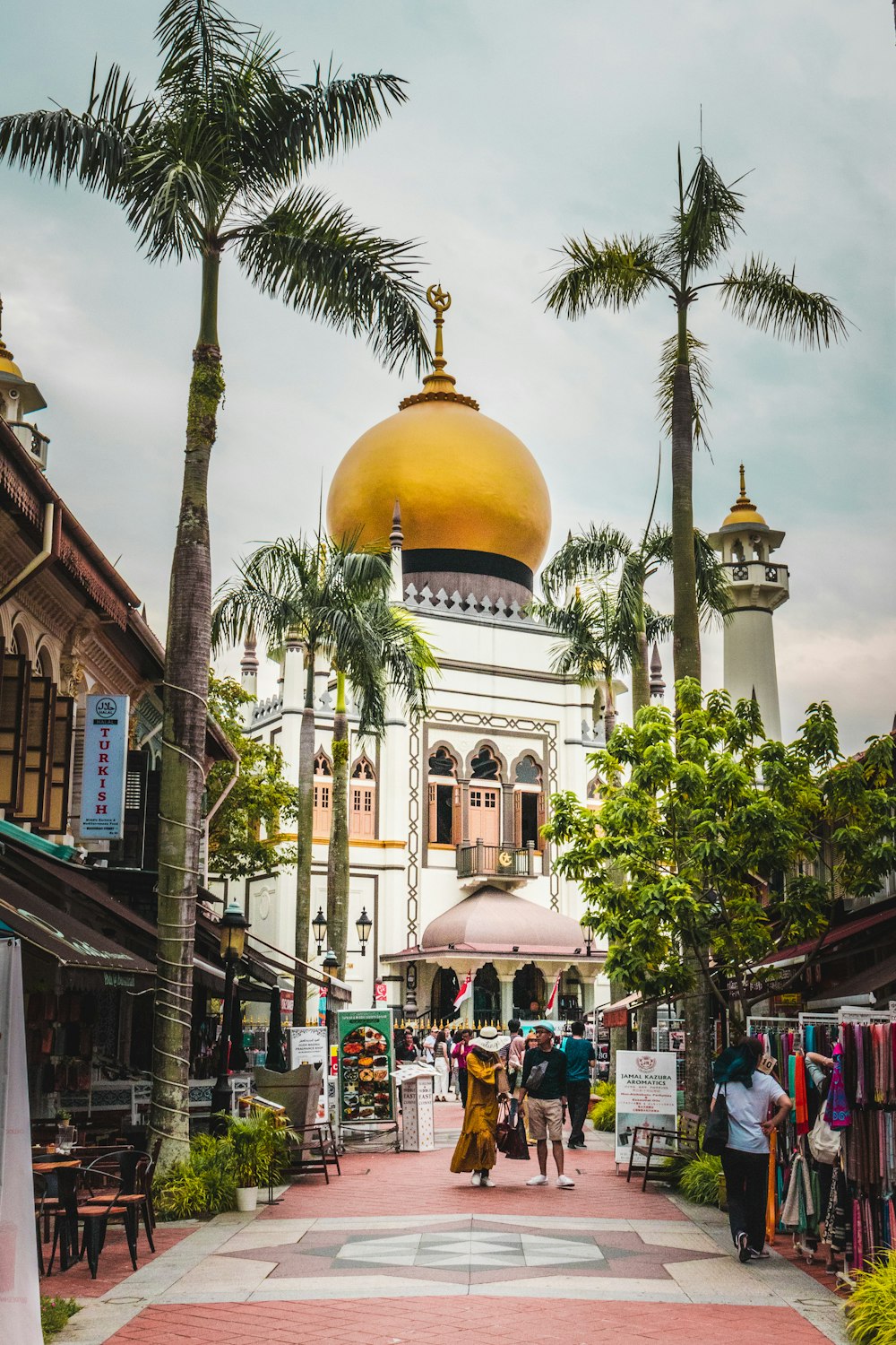 people walking near mosque