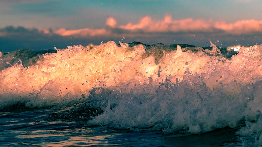 body of water waves during daytime