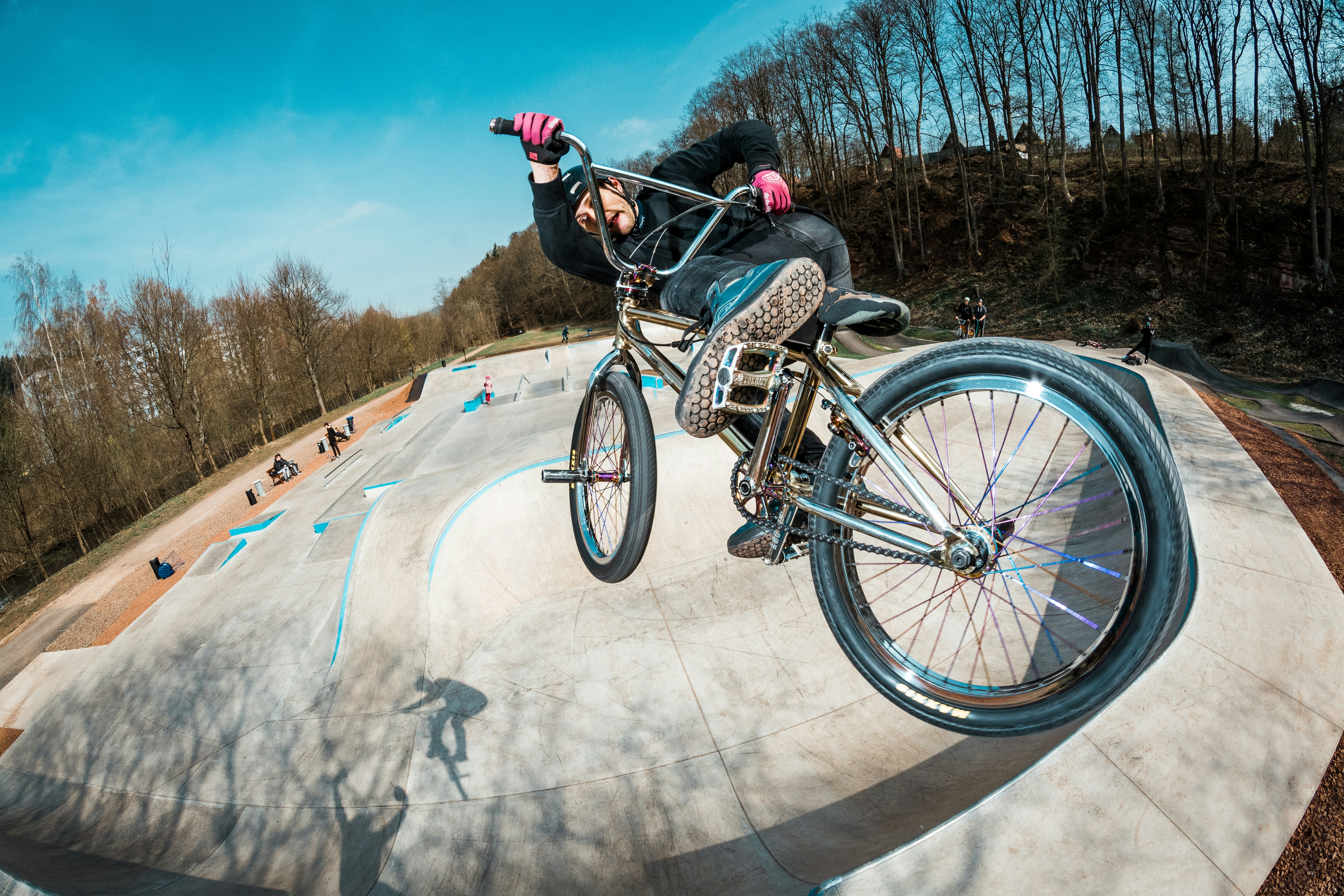 man doing tricks riding on BMX bike