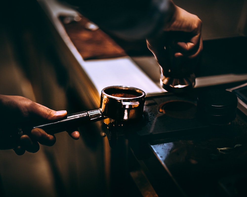 person making a coffee latte