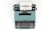 teal and black typewriter machine