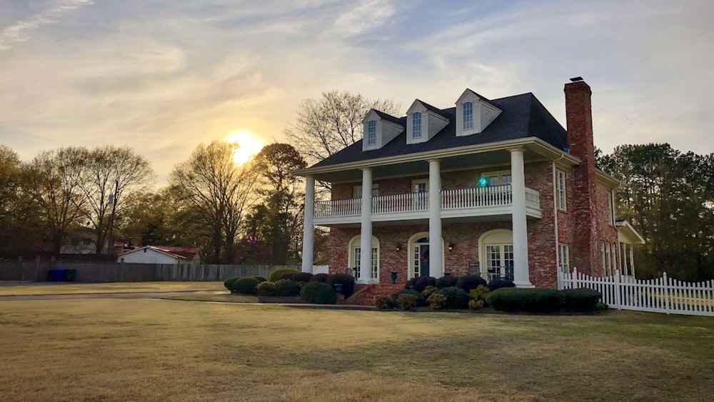 architectural photo of a red, white and blue house