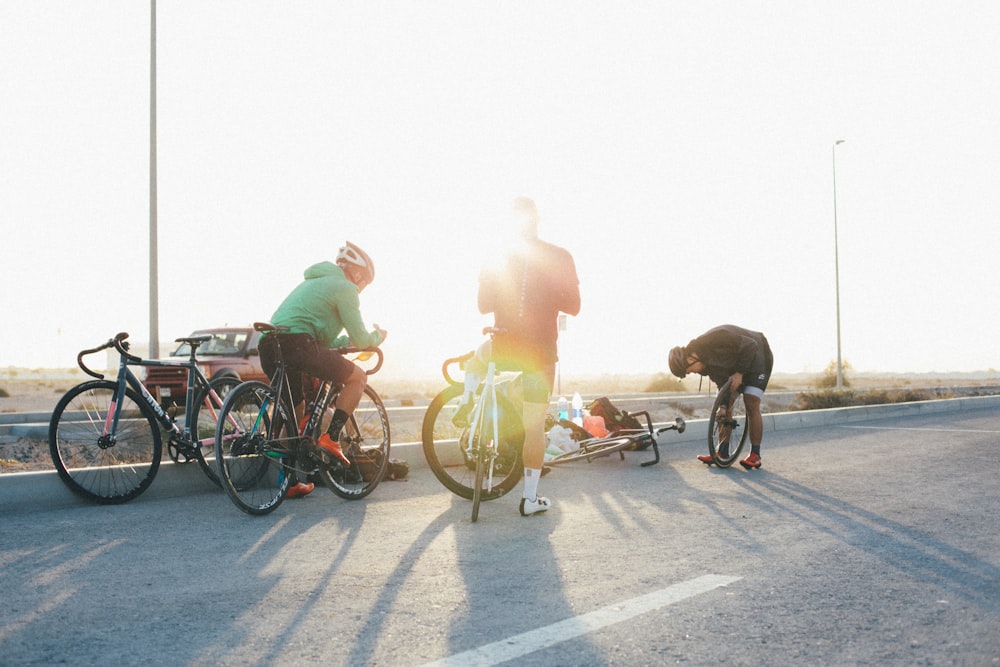 three road bike riders