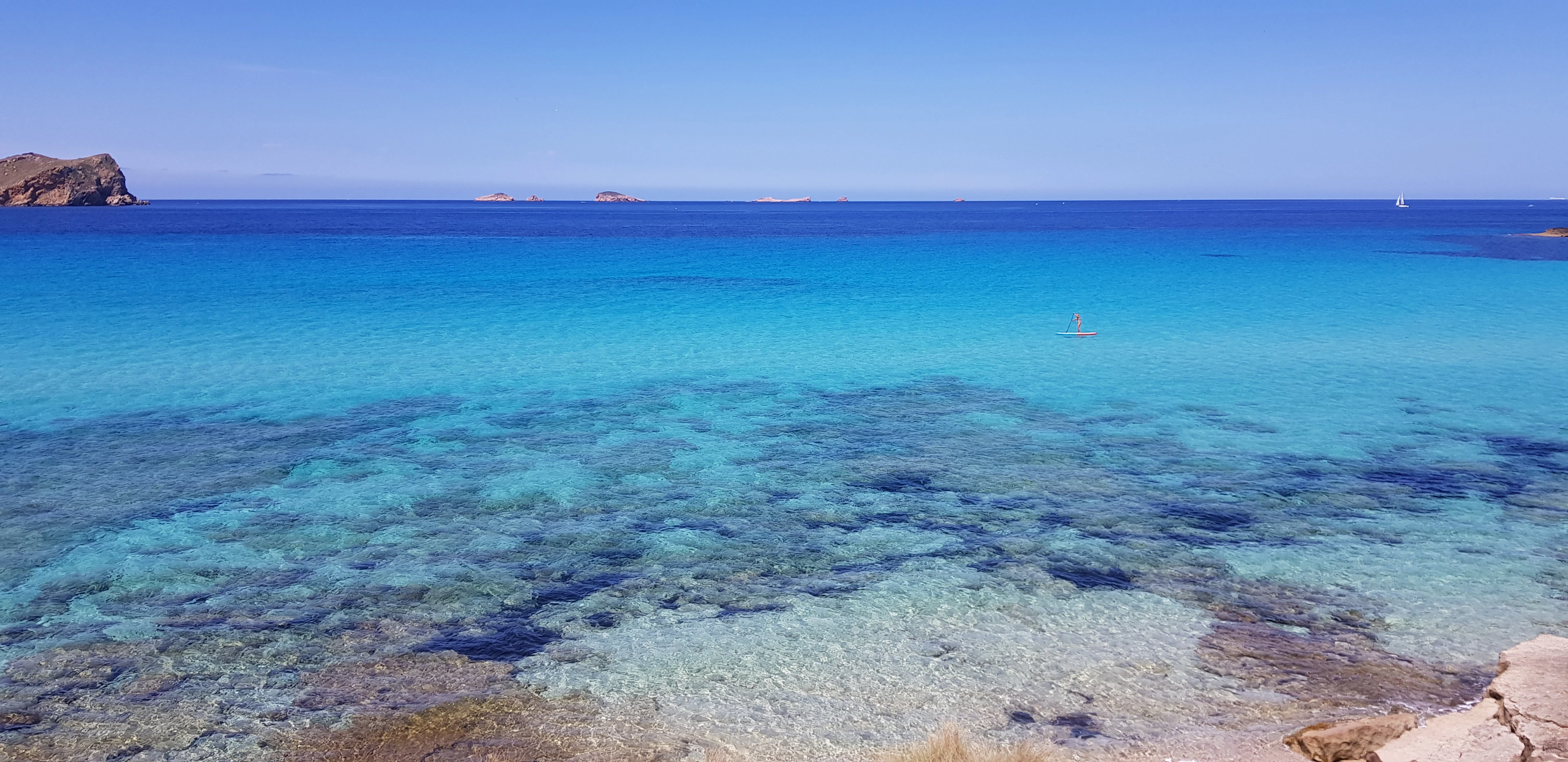 Clear turquoise water at Cala Comte, Ibiza