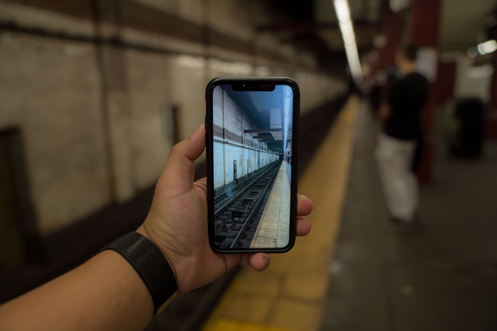 person holding smartphone