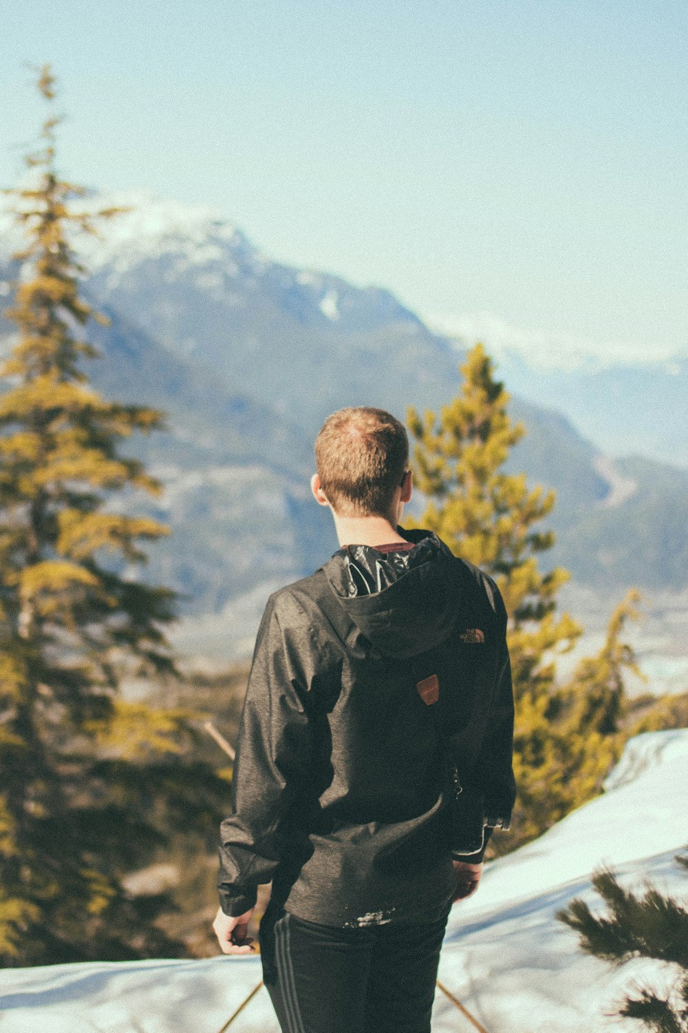 man overlooking mountain