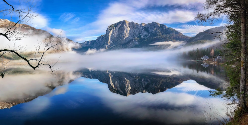 mirror photography of mountain