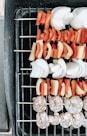 skewered food on grill