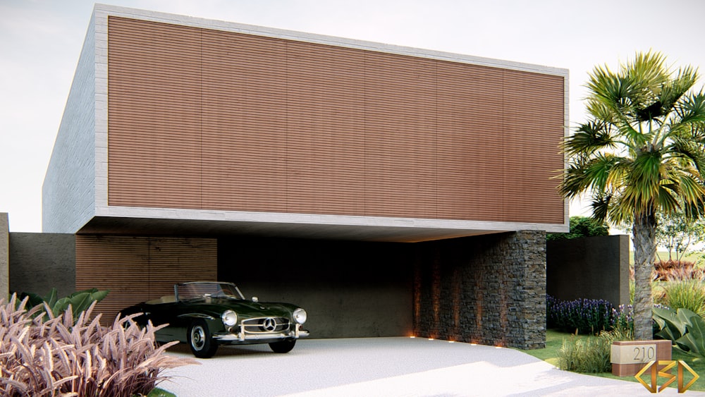 classic black convertible coupe parked beside building