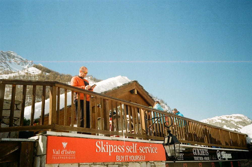 person standing on porch during daytime