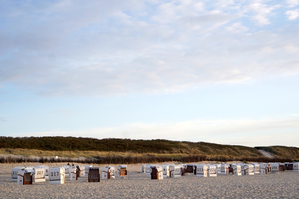 houses on sand during daytime