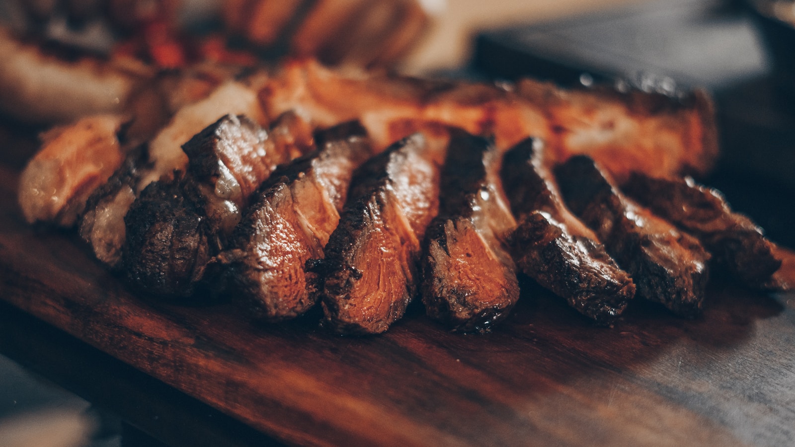Juicy sliced steak with rosemary