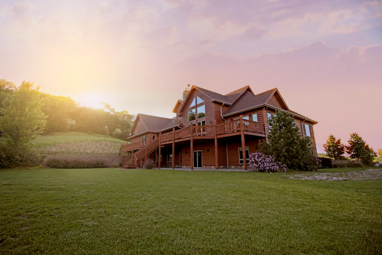 Country house on an open grassy field