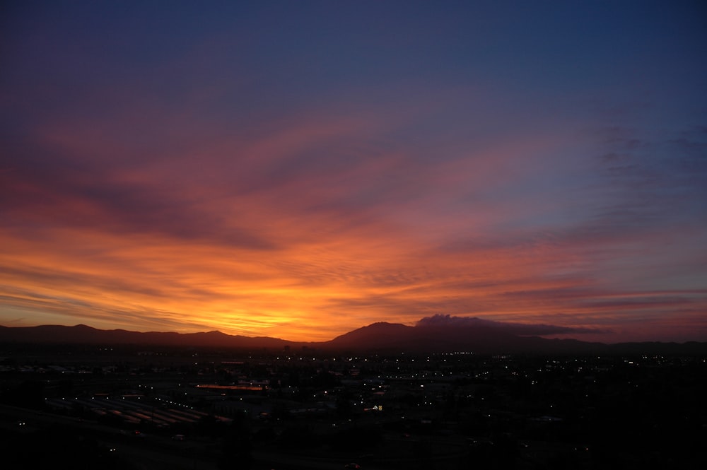 silhouette of mountain during golden hour