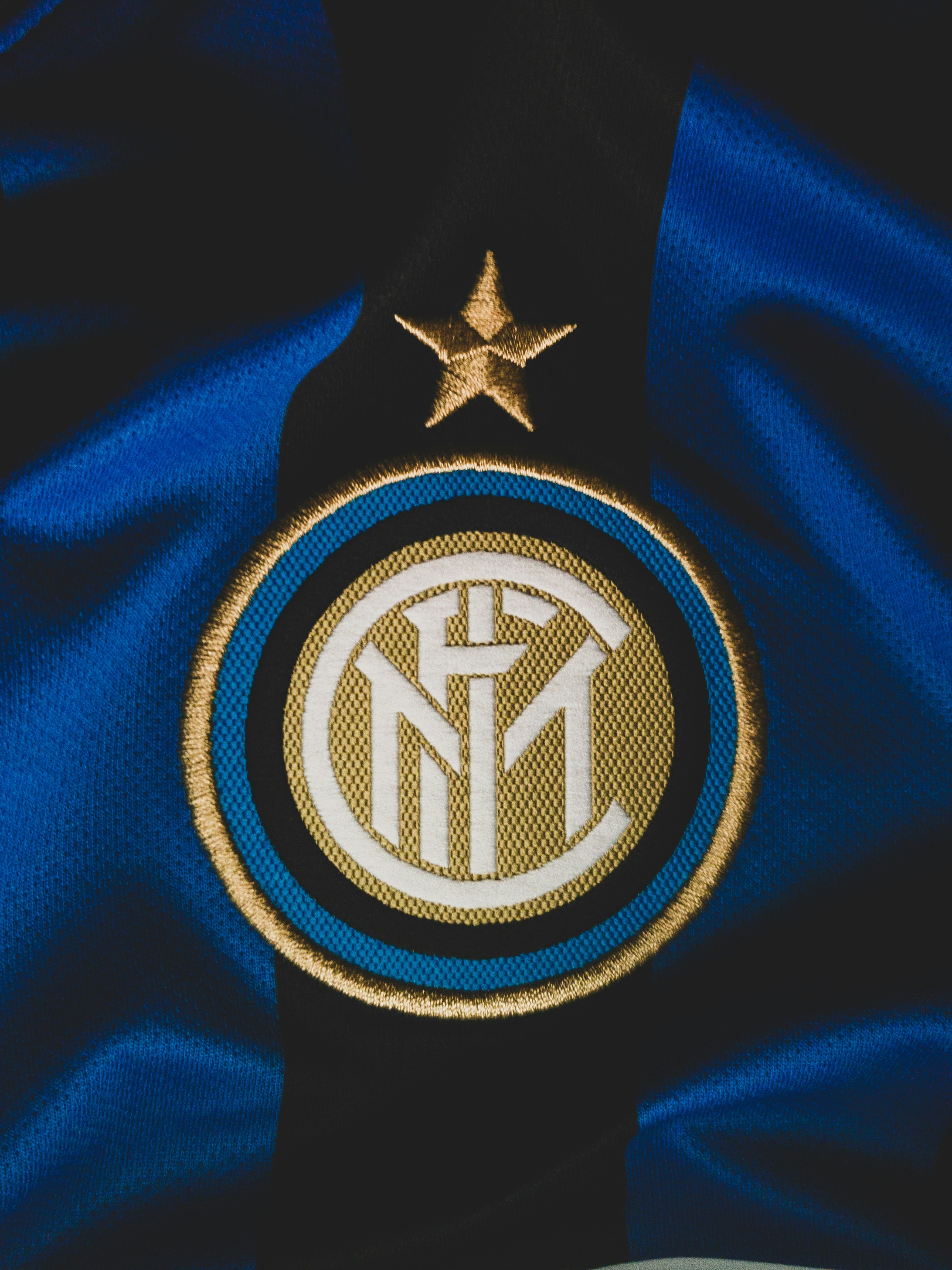 Blue and black striped Inter Milan football jersey product shot, Nerazzurri home kit, sportswear photography