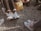 A person wearing shoes at a casual outdoor gathering.