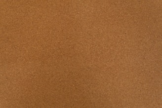 a close up view of a brown surface