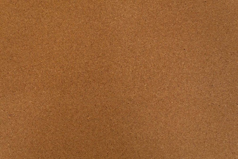 Close-up of a fine-grained natural cork surface in warm brown tones