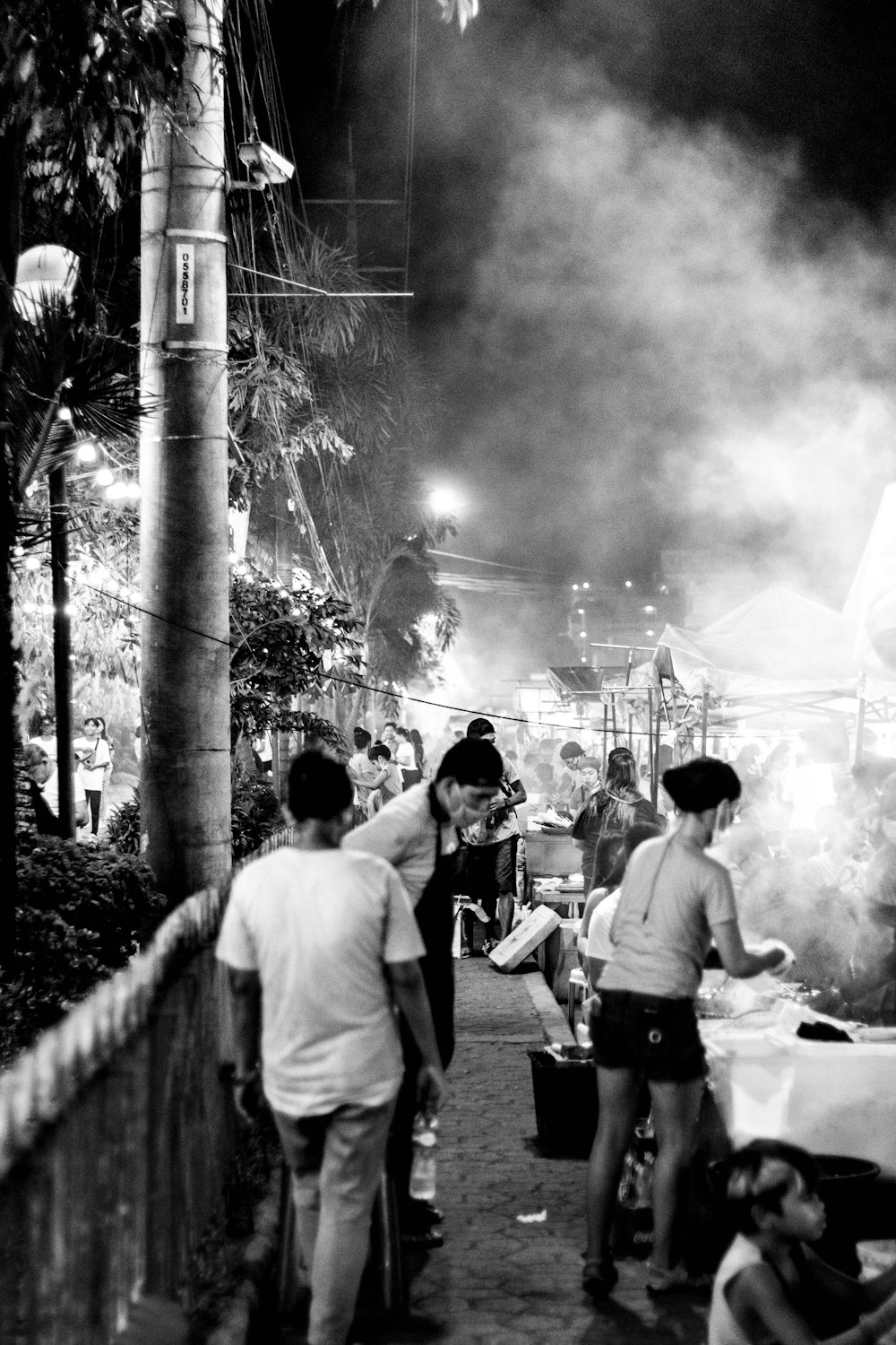 grayscale photo of people on street