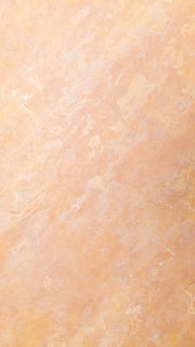 an orange and yellow marble textured background