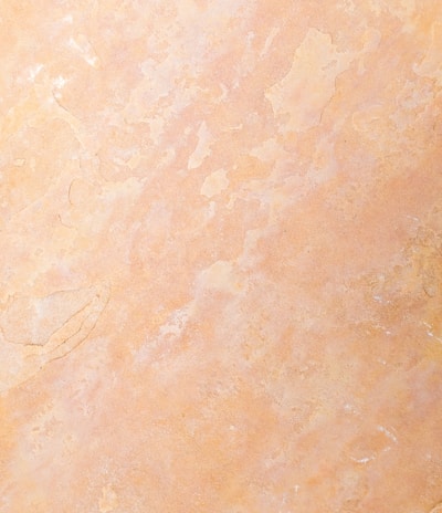 an orange and yellow marble textured background