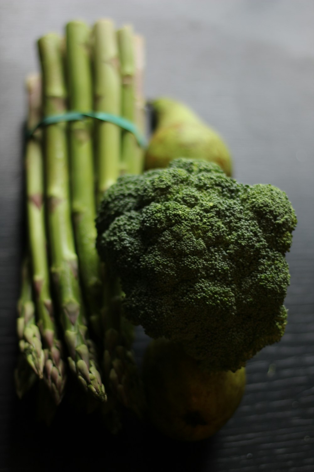 broccoli and asparagus on a table