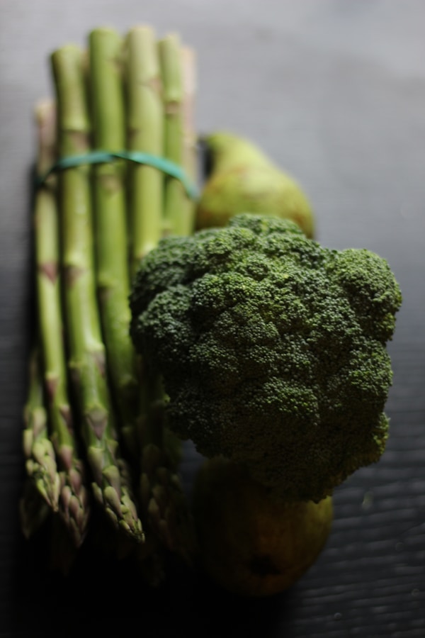 Broccoli and asparagus on a table