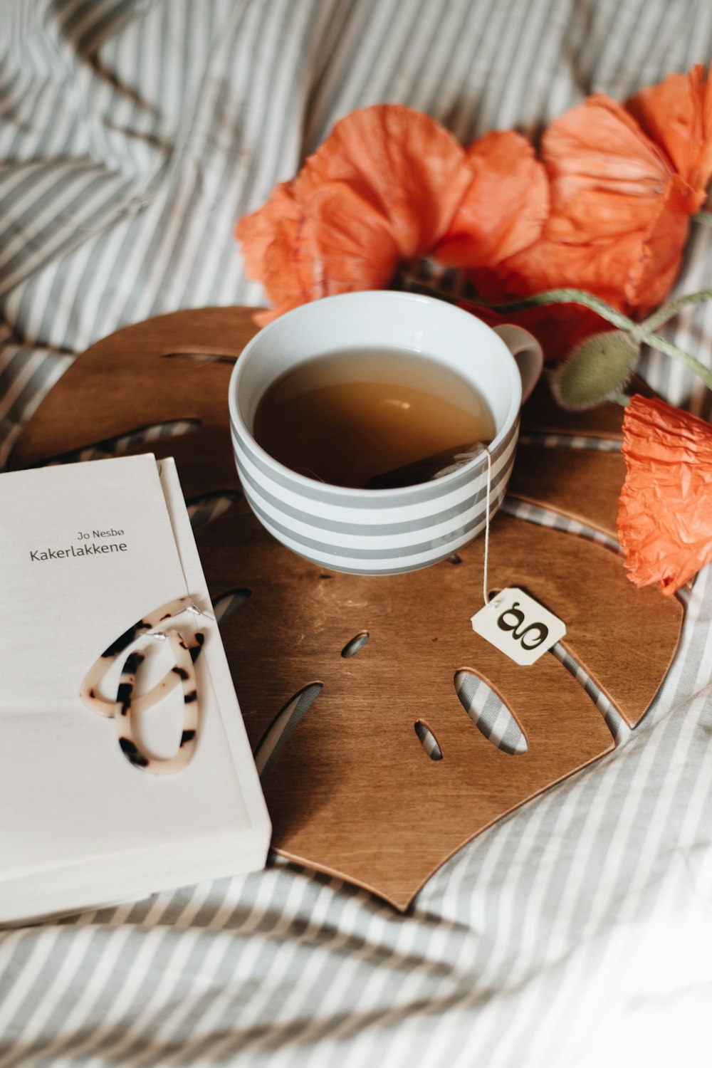 white and grey striped ceramic mug