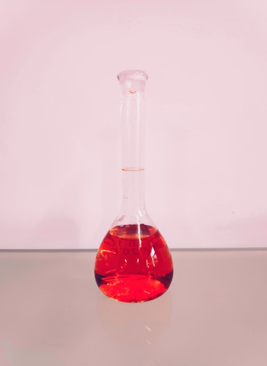 clear-glass tube on white table