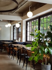 A stylish cafe interior showcasing modern furniture and inviting decor.