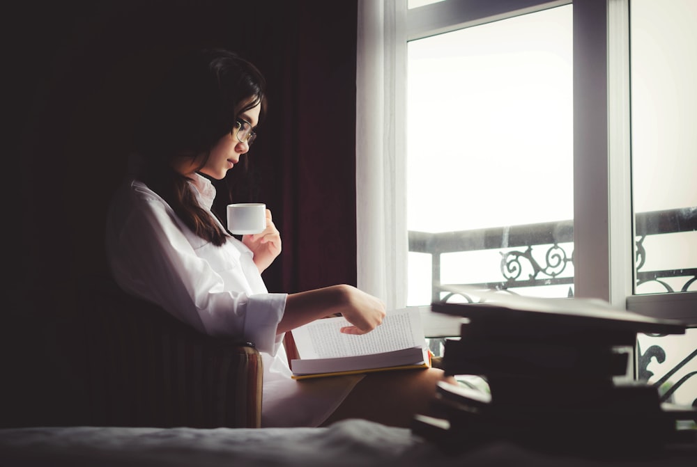 woman holding mug