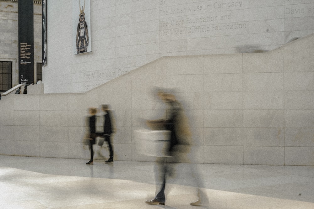 three people walking