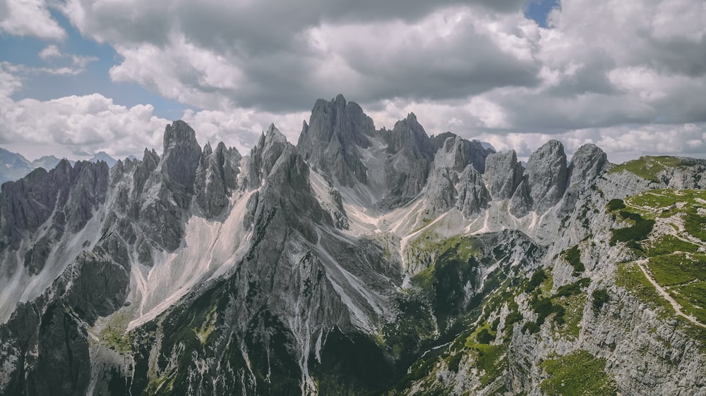 rocky and grass covered mountains