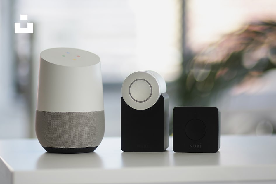 white and gray Google smart speaker and two black speakers photo – Free  Nuki Image on Unsplash