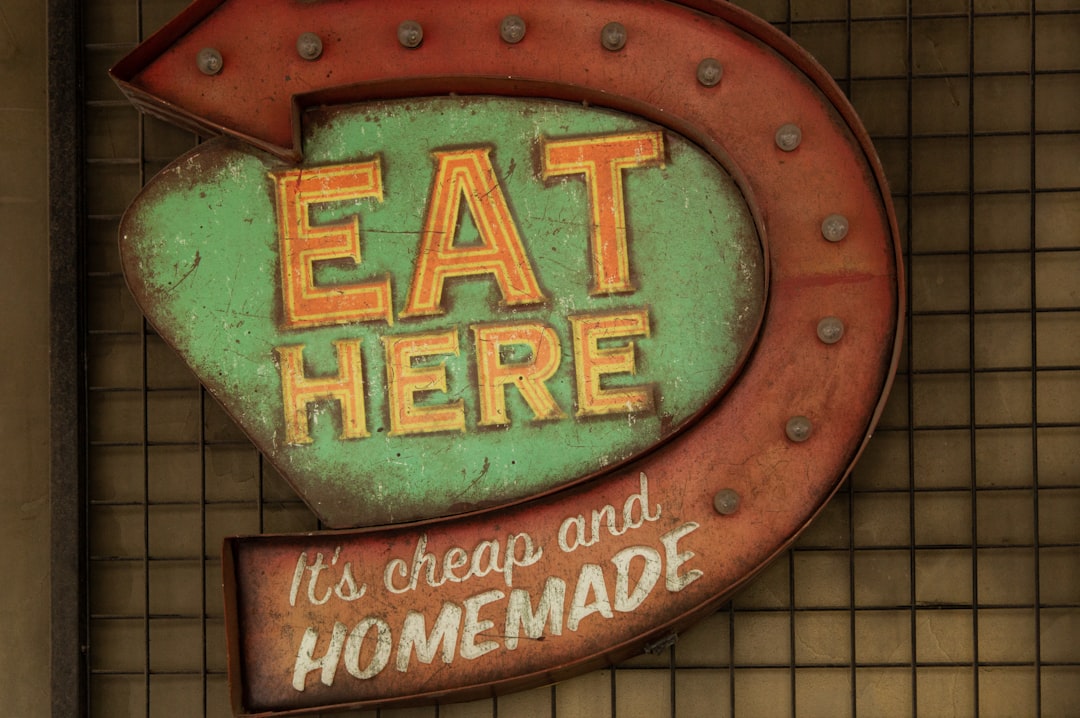 Eat Here its cheap and homemade, Sign for a homemade food spot