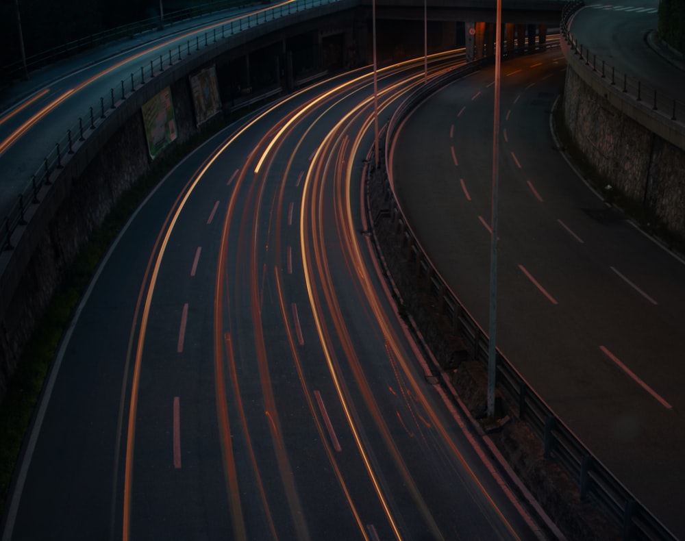 time lapse photo of vehicle lights