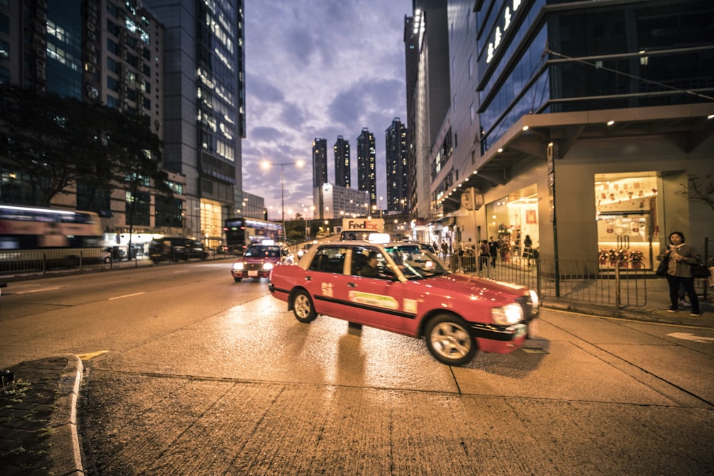 panning photography of vehicles on road