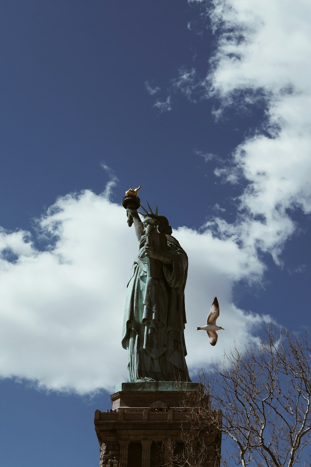 grey statue during daytime